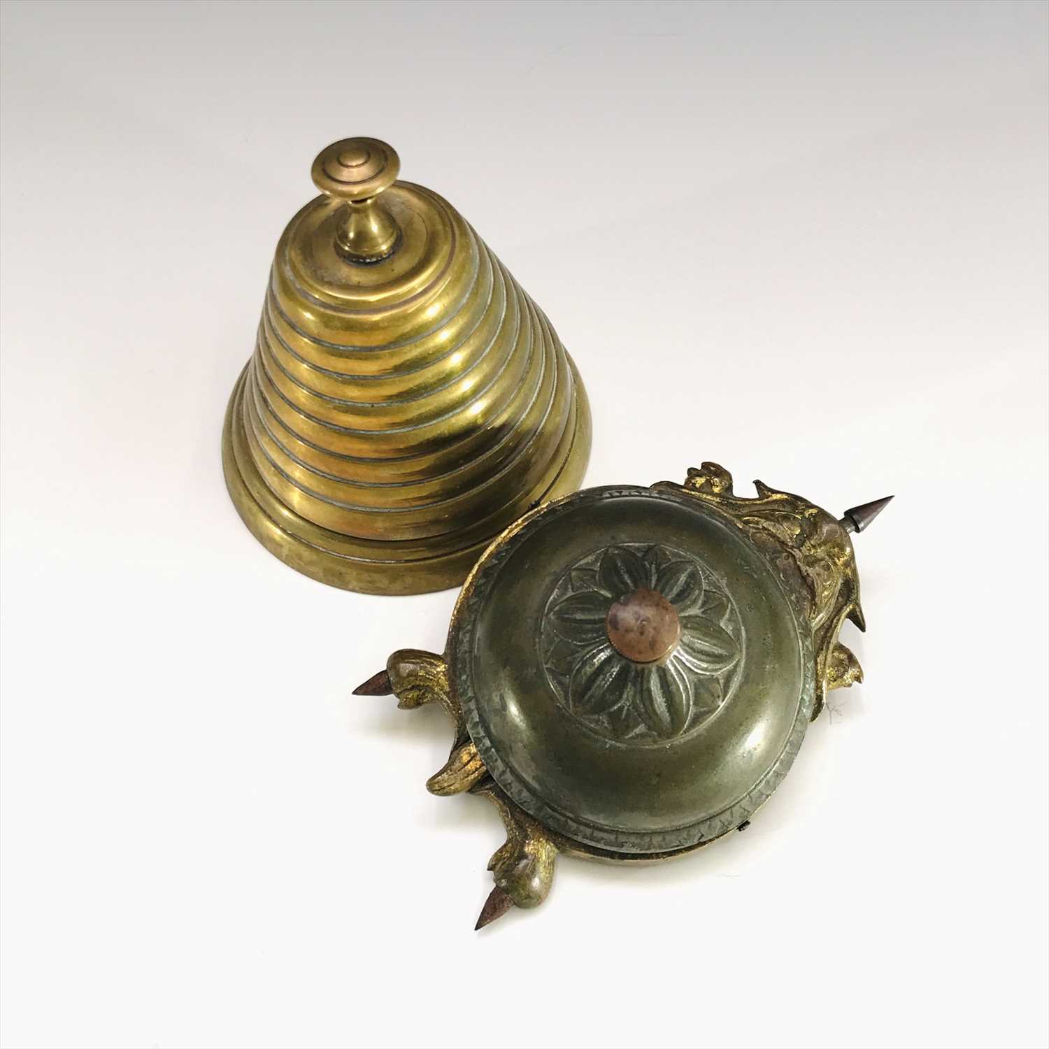 Lot 8 - An early 20th century clockwork table bell in...