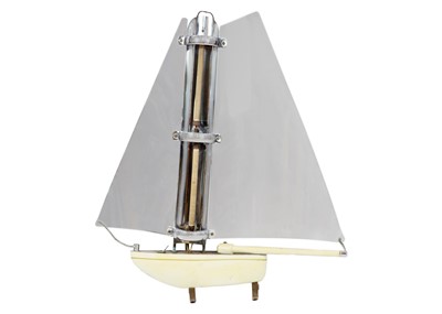 Lot 74 - An electric fire in the form of a sailing boat.