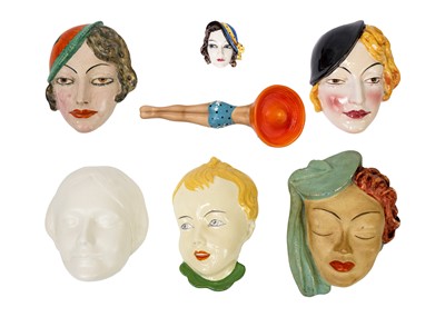 Lot 158 - A collection of Art Deco six wall masks.