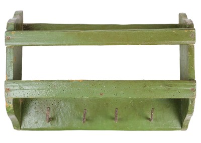 Lot 304 - A George III naive green painted wood hanging shelf.