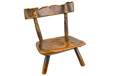 Lot 305 - An 18th/19th century fruitwood backstool.