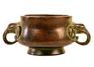 Lot 1096 - A small Chinese bronze censer.