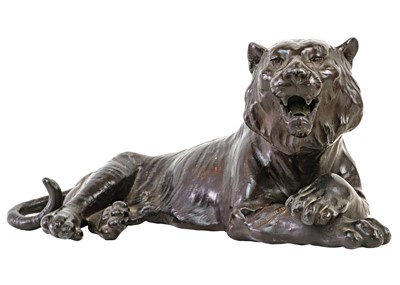 Lot 1097 - A Chinese bronzed model of a tiger.