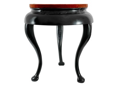 Lot 307 - An ebonised display stand, 20th century.