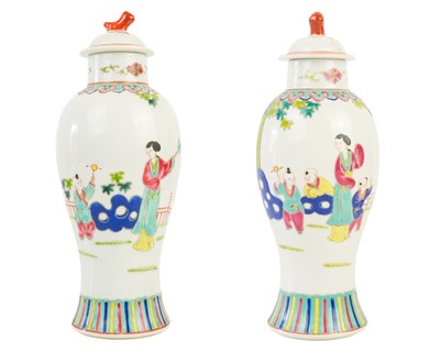 Lot 1103 - A pair of Chinese famille rose vases, mid 20th century.