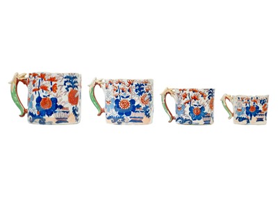 Lot 1441 - A set of four graduating Mason's Ironstone serpent handled porter mugs.