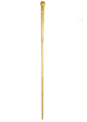 Lot 64 - A 19th century sailor's whalebone and marine ivory walking cane.