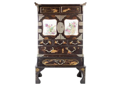 Lot 1107 - A large Japanese black lacquered table cabinet, 19th century.