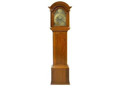 Lot 1112 - An oak eight-day longcase clock.