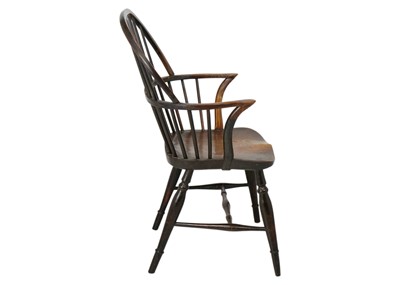 Lot 1274 - An ash, elm, and fruitwood hoop back Windsor armchair.