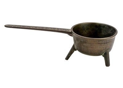 Lot 1155 - A George III bronze skillet.