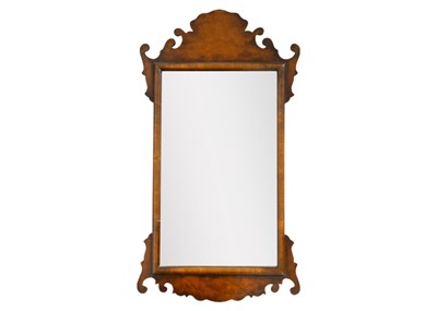 Lot 1621 - A George III style burr walnut veneer fretwork mirror.