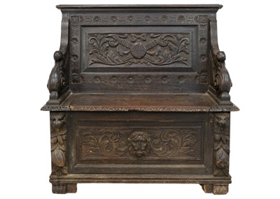 Lot 1105 - A late Victorian oak carved hall bench.