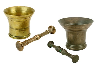 Lot 1113 - An 18th century bronze pestle and mortar.