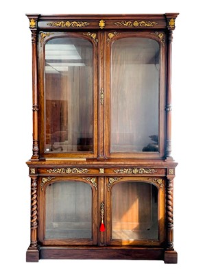 Lot 1011 - A George IV rosewood and gilt bronze two part bookcase cabinet.