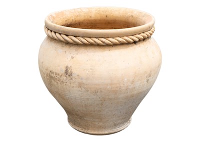 Lot 1575 - A terracotta planter with rope twist decoration.