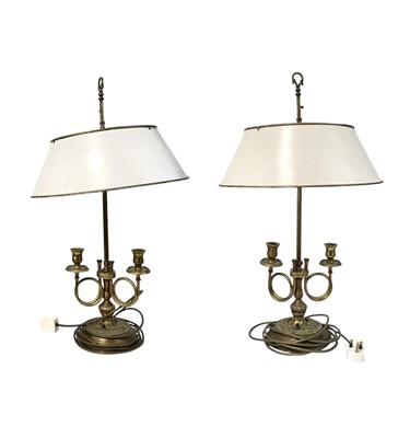 Lot 321 - A pair of French brass Bouilotte type Lamps.