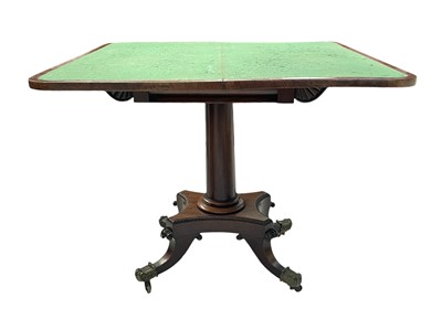 Lot 1002 - A William IV figured mahogany fold-over card table.