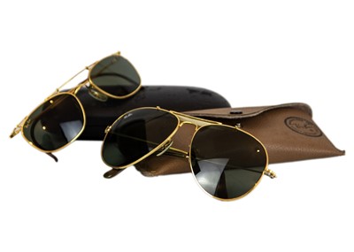 Lot 345 - Two pairs of Ray-Ban Aviator style sunglasses.