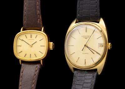 Lot 102 - LONGINES - A gold-plated gent's quartz wristwatch and a lady's manual wind wristwatch.