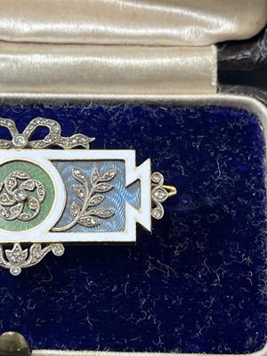 Lot 8 - CARTIER - An exquisite Belle Epoque gold, diamond and guilloche enamel panel brooch.