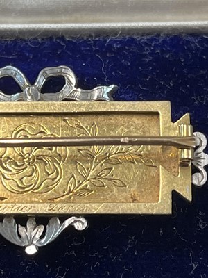 Lot 8 - CARTIER - An exquisite Belle Epoque gold, diamond and guilloche enamel panel brooch.