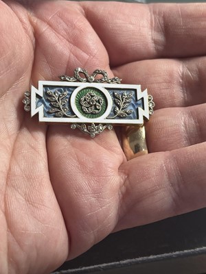 Lot 8 - CARTIER - An exquisite Belle Epoque gold, diamond and guilloche enamel panel brooch.
