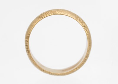 Lot 11 - A 9ct hallmarked gold band ring.