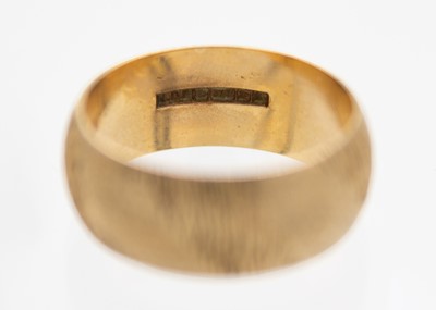 Lot 11 - A 9ct hallmarked gold band ring.