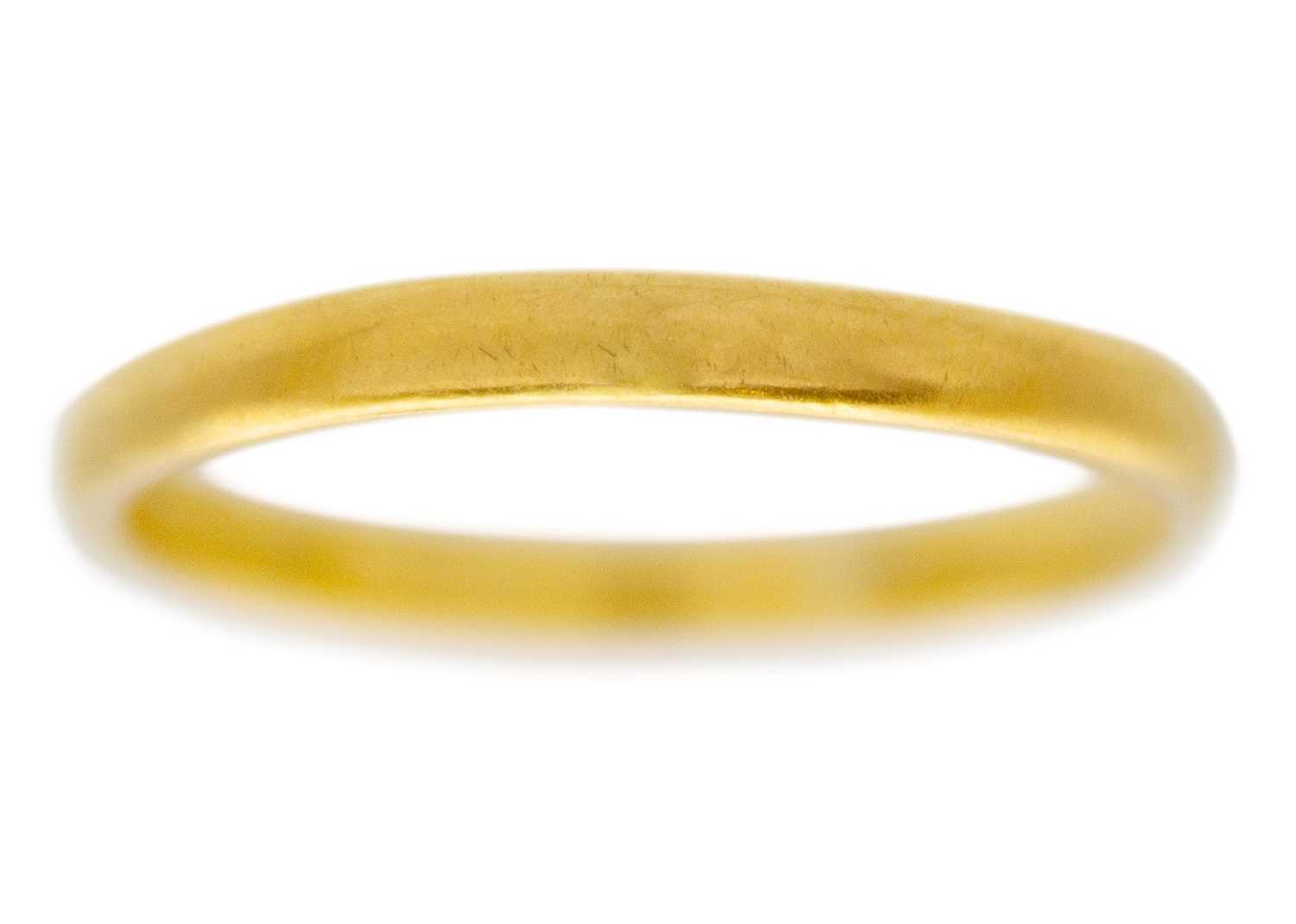 Lot 15 - A 22ct hallmarked gold band ring.