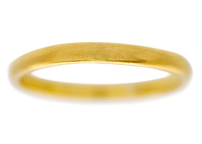 Lot 15 - A 22ct hallmarked gold band ring.