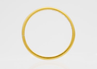 Lot 15 - A 22ct hallmarked gold band ring.