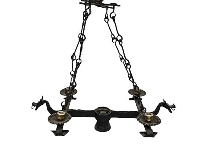 Lot 332 - An unusual Spanish wrought iron hanging five light electrolier.