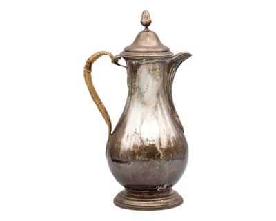 Lot A George III silver coffee pot by Robert Makepeace & Richard Carter.