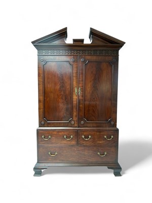 Lot 1688 - A Chippendale period linen press