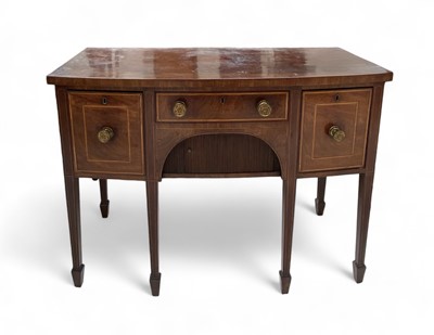 Lot 885 - A George III mahogany bow front sideboard