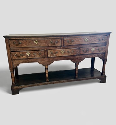 Lot 1145 - A George III low dresser