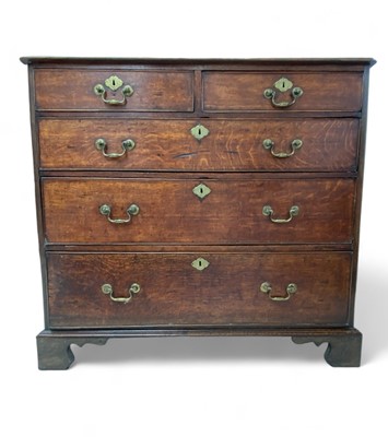 Lot 1079 - George III oak chest of drawers