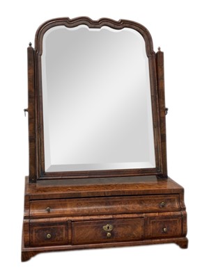 Lot 1168 - A Queen Anne walnut toilet mirror.