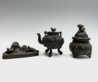Lot 212 - A Chinese miniature bronze koro and cover,...