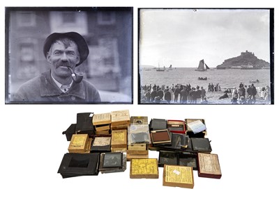 Lot 1334 - A very large collection of Edwardian and later glass plate negatives and magic lantern slides.