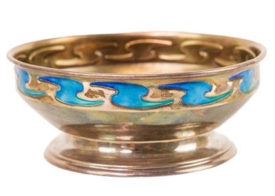 Lot 1312 - An Arts and Crafts silver and enamel footed bowl.