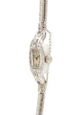 Lot 138 - An Art Deco platinum diamond set cocktail bracelet watch by Hamilton.