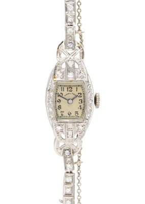 Lot 25 - An Art Deco platinum diamond set cocktail bracelet watch by Hamilton.