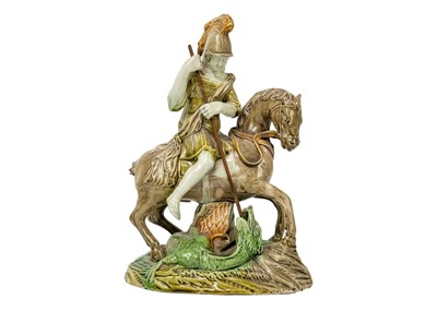 Lot 1076 - A late 18th century Ralph Wood type pearlware model of St George and the Dragon.