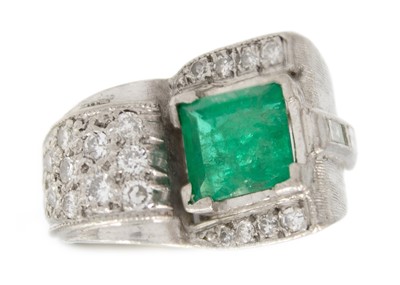 Lot 32 - A stylish Art Deco 18ct white gold emerald and diamond set dress ring.