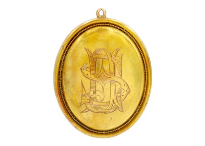 Lot 60 - A Victorian high-purity gold (tests 14ct) large locket pendant.