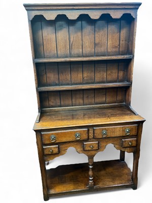 Lot 959 - A Titchmarsh & Goodwin oak dresser, of diminutive proportions.