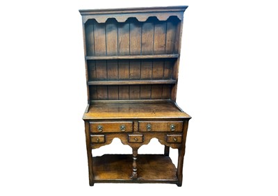 Lot 686 - A Titchmarsh & Goodwin oak dresser, of diminutive proportions.