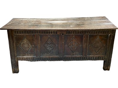 Lot 945 - A 17th century oak coffer.